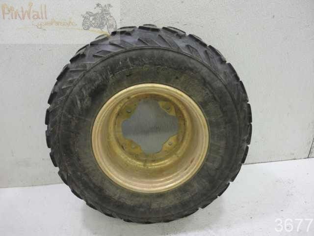   KT701 AT22X7 10 TREAD= 35% RIM= 10X6.0 GOUGES AROUND EDGE AS SHOWN