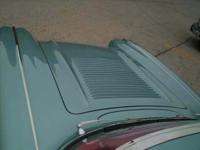   photos restored to museum quality 58 had the nice straps on the trunk